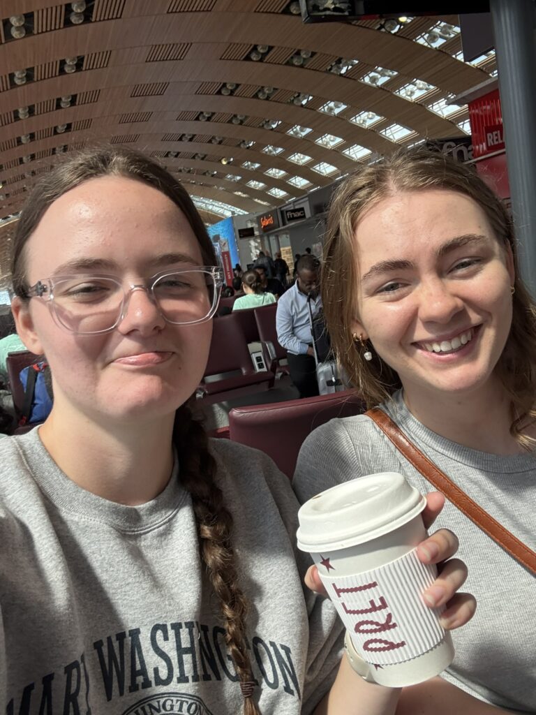 girls in airport with coffee